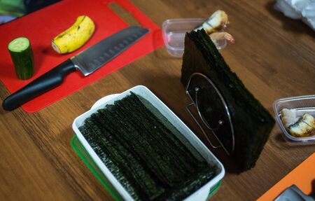 Image of ingredients for sushi and rolls, preparation of foodの写真素材