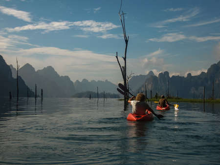 Landscape with silhouette  at Chieou Laan lake in Thailandの写真素材