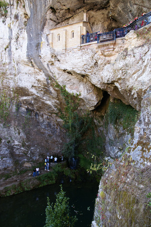 Covadonga chapel, Santa Cueva sanctuary, Asturias, Spain â September 06, 2008, Tourists visiting the  Covadonga chapel, Santa Cueva sanctuary, Asturias, Spainのeditorial素材