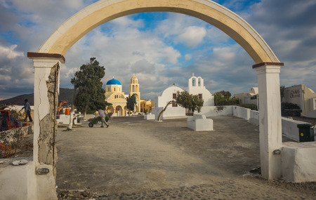 Cityscape with workers in Oia town, Santorini island, Greeceのeditorial素材