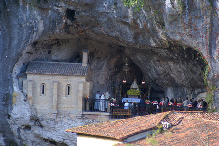 Covadonga chapel, Santa Cueva sanctuary, Asturias, Spain â September 06, 2008, Tourists visiting the  Covadonga chapel, Santa Cueva sanctuary, Asturias, Spainのeditorial素材