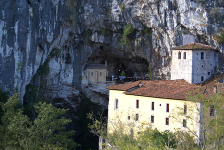 Covadonga chapel, Santa Cueva sanctuary, Asturias, Spain â September 06, 2008, Tourists visiting the  Covadonga chapel, Santa Cueva sanctuary, Asturias, Spainのeditorial素材