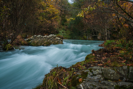 Autumn landscape with multicolored trees in gorge of Louise on Peloponnese in Greeceの写真素材