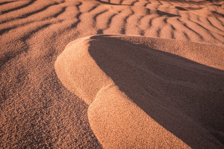Image of light and shadows on  sand on the beach in Greeceの写真素材