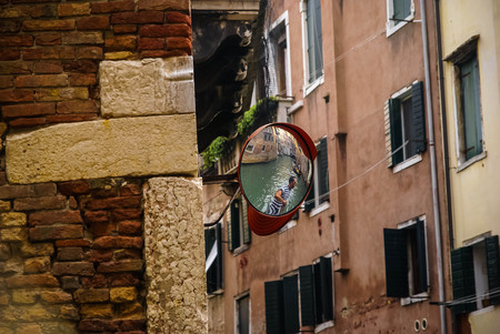 Venice, Italy - SEPTEMBER 21, 2009:  People and gondolas on chanels of Venice, Italyのeditorial素材