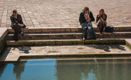 Venice, Italy - MARCH 23, 2011:  People  on the chanels of Venice, Italyのeditorial素材