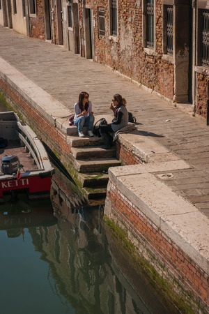 Venice, Italy - MARCH 23, 2011:  People  on the chanels of Venice, Italyのeditorial素材