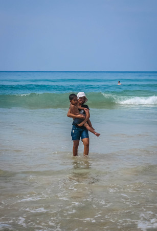 Koh Samui, Thailand - January 15, 2011 : People bathing in the sea at  Koh Samui in  Surat Thani in Thailandのeditorial素材