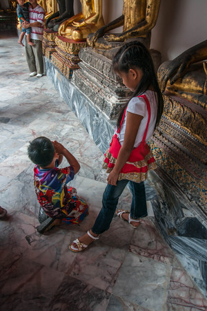 Bangkok, Thailand - January 01, 2011 :  People in the temples of Bangkok, Thailandのeditorial素材