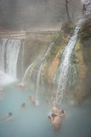 Lutra Posar, Greece - January 04, 2016: People bathing in thermal spring in fog at Loutra Posar in Greeceのeditorial素材