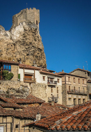 Cityscape with ruined castle in town of Frias in province of Burgos in Castilla y Leon in Spainの写真素材