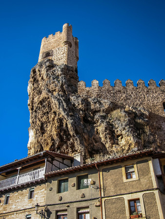 Cityscape with ruined castle in town of Frias in province of Burgos in Castilla y Leon in Spainの写真素材