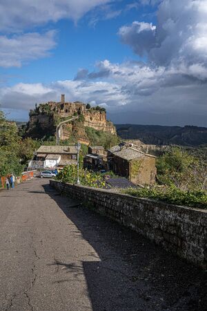 Civita di Bagnoregio, Italy - November 04, 2019, People on the brige to Civita di Bagnoregio in...