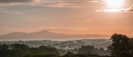 Image of morning fog in the early dawn hours in Rome, Italy