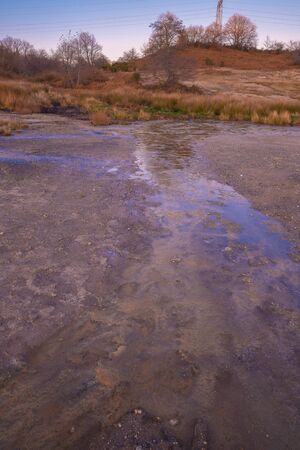 Image of old crater in Manziana - carbon dioxide coming out of the earth through water and forming...
