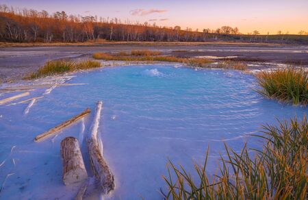 Image of old crater in Manziana - carbon dioxide coming out of the earth through water and forming small geyser, Lazio, Italyの写真素材