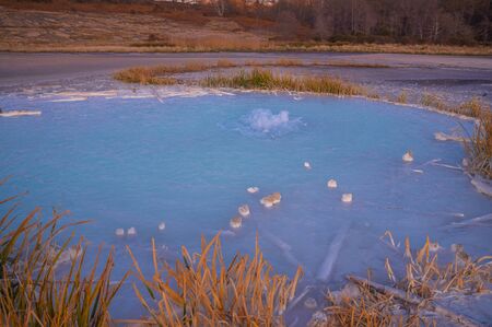Image of old crater in Manziana - carbon dioxide coming out of the earth through water and forming...