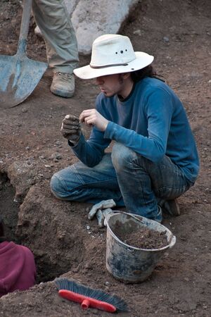 Roma, Italy - March 24, 2011, Students Archaeologists on excavations in Rome near arch of Trajan in Italyのeditorial素材