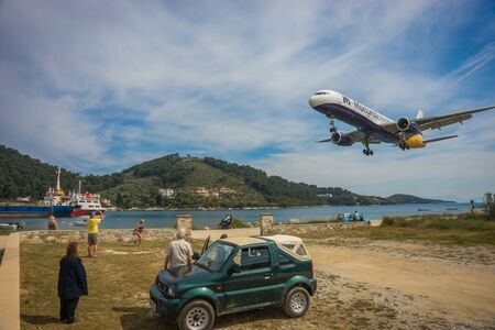 Skiathos, Greece - May 09, 2014, Plane coming in to land low on Skiathos island in Greeceのeditorial素材
