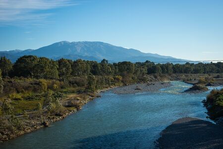 Image of river with blue waters near Meteora in Greeceの写真素材