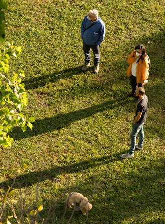 Rome, Italy - May 21, 2020, People in medical masks walking dogs in a Rome park, Italy during self-isolationのeditorial素材
