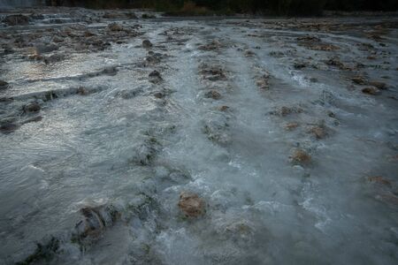 Saturnian natural spa with waterfalls and hot springs at  thermal baths in Tuscany in Italy