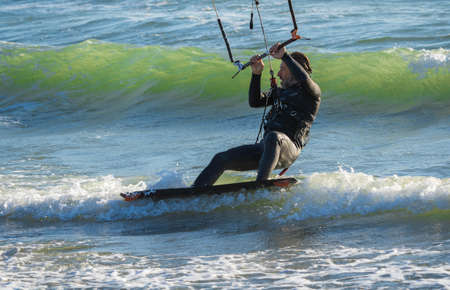 Marina di San Nicola, Italy - October 08, 2020, Lone kiter in sunny weather on the beach of Marina di San Nicola in Italyのeditorial素材