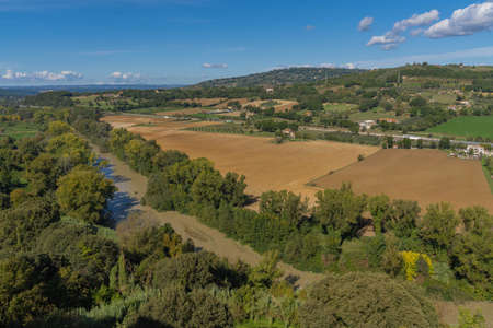 Picturesque landscape with Tiber river near medieval town of Orte in Italyの写真素材