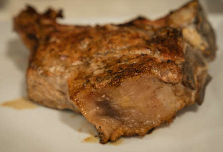 Image of florentine steak with lemon (selective focus)