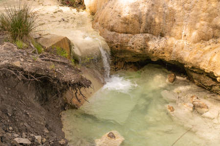 Free outdoor thermal pools in Bagni di San Filippo, Tuscany in Italyの写真素材