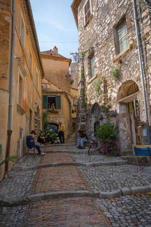 Castro del Volsci, Italy - June 13, 2021, People in masks on the street Castro del Volsci, Fronzinone, Italyのeditorial素材
