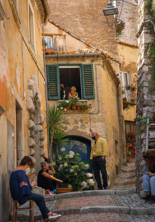 Castro del Volsci, Italy - June 13, 2021, People in masks on the street Castro del Volsci, Fronzinone, Italyのeditorial素材
