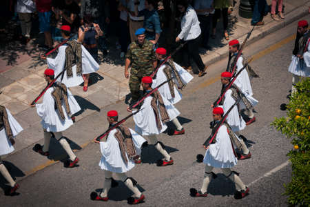 Athens, Greece - September 22, 2012, Top view of a parade of guardsmen in traditional costumes near the royal gardens in Athens in Greeceのeditorial素材