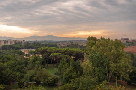 Scenic sunrise in the fields of southern Rome in Italyの写真素材