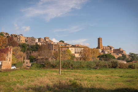 View of medieval town of Sutri from neighboring fields in Lazio in Italyの写真素材