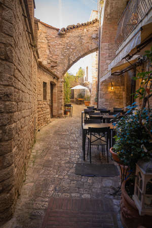 Picturesque cityscape in the pink stone city of Assisi in Perugia in Italyの写真素材