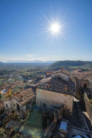 View of rooftops of Alatri from Acropolis and rays of sun, Fronzinone in Italyの写真素材