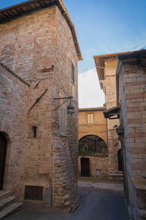 Picturesque cityscape in the pink stone city of Assisi in Perugia in Italyの写真素材