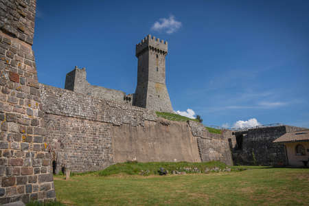 Ruins of medieval castle in Radicofani in Tuscany in Italyの写真素材