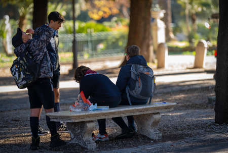 Rome, Italy - December 19, 2021, Buddies on a walk in the Pincho Gardens in Rome, Italyのeditorial素材