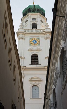 Steeple of Dome St. Stephan Passau Street View between Buildingsの写真素材