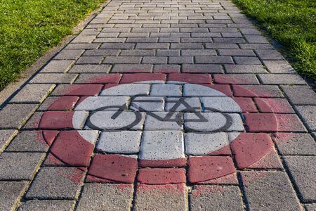 Traffic sign painted on the road, bicycles are forbidden on this wayの写真素材