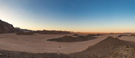 Panorama of the Arabic stone desert near hurghada egypt at sunset