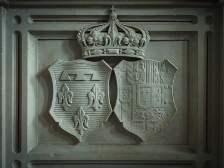 Dreux, France, April 30, 2019: Closup of an Royal emblem at the base of a tomb inside of Chapel...