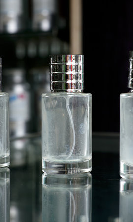 Dull colored used bottles made of glass to reuse liquids.の写真素材