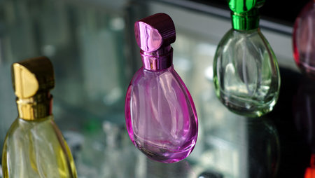 pink used bottle made of glass for recycling liquids.の写真素材