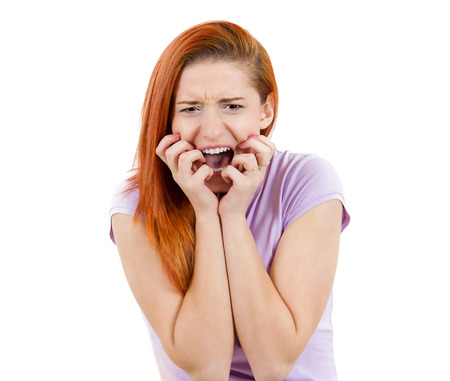 Closeup portrait stressed business woman, having panic attack, yelling,  screaming with temper tantrum isolated white background. Negative human emotion facial expression, reaction attitude perceptionの写真素材