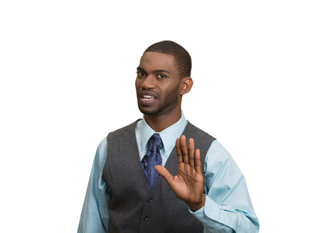 Closeup portrait furious angry annoyed displeased young man raising hands up to say no stop right there isolated white background. Negative human emotion facial expression sign symbol body languageの写真素材