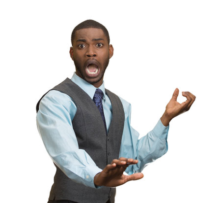 Closeup Portrait of young Man looking Shocked isolated on white backgroundの写真素材