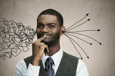 Closeup portrait business man thinking about something, finger on lips looking for solution of problem isolated black background. の写真素材